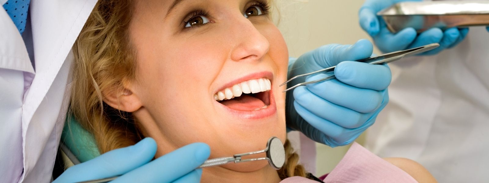 Girl at Dentist office happy