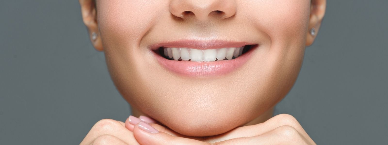 Close up of mouth of smiling girls