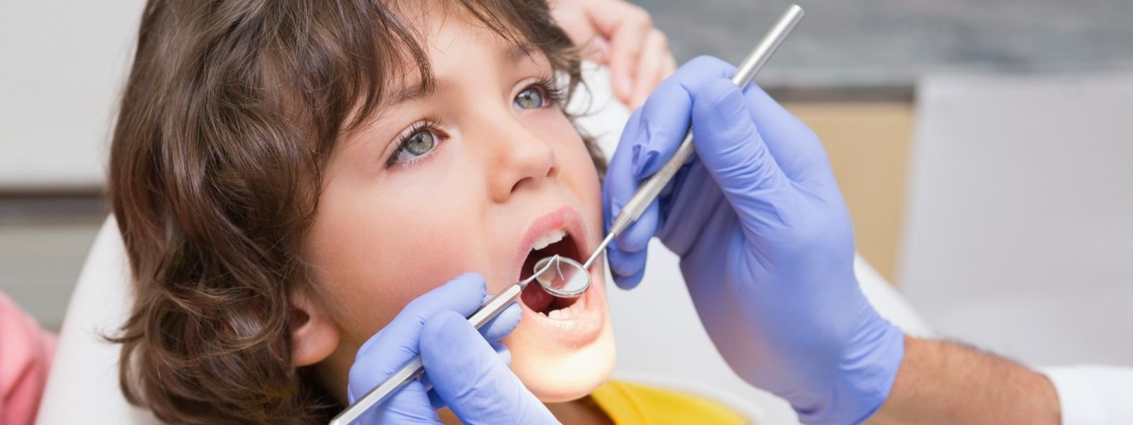 Blue eyed boy at Dentists